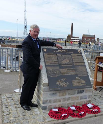 Ross Bastiaan by the new bronze plaque - M33 (credit: Major Holt)